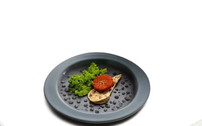 Une illustration moderne montrant un évier de cuisine équipé d’un bouchon pratique pour retenir les résidus. L’image évoque la prévention des bouchons et des mauvaises odeurs au quotidien.