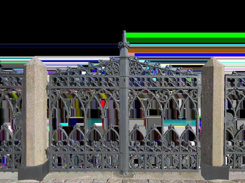 ornate metal gate flanked by stone pillars against a city backdrop ornate metal gate flanked by stone pillars against a city backdrop